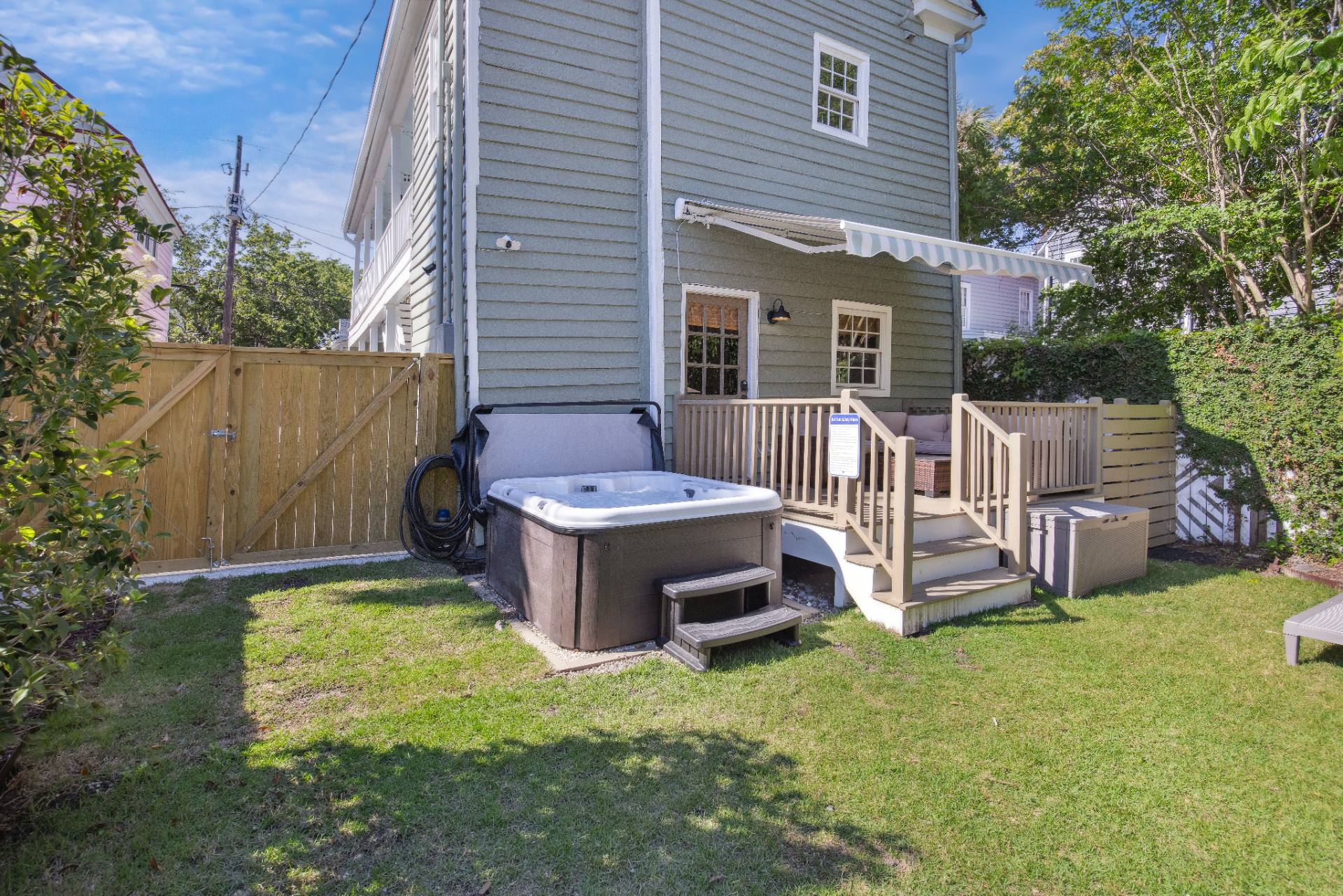 Garden fountain, loungers, and sauna